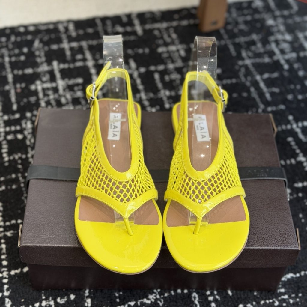 Alaia Ankle-Strap Flat Sandals in Genuine Lambskin with Calfskin Lining and Durable Rubber Sole