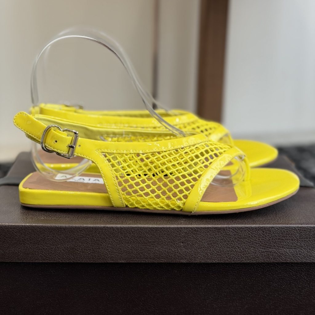Alaia Ankle-Strap Flat Sandals in Genuine Lambskin with Calfskin Lining and Durable Rubber Sole