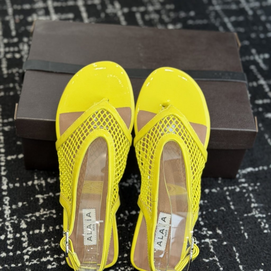 Alaia Ankle-Strap Flat Sandals in Genuine Lambskin with Calfskin Lining and Durable Rubber Sole