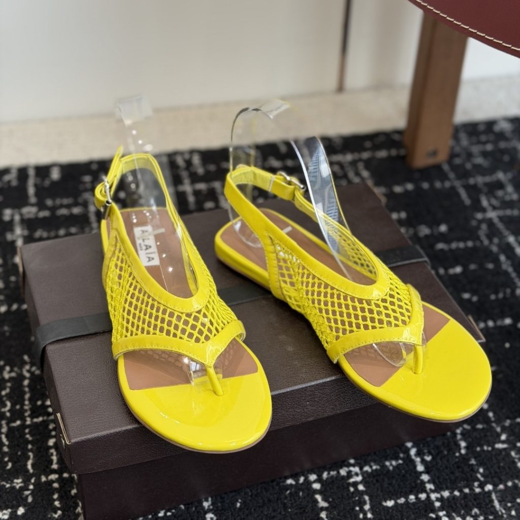 Alaia Ankle-Strap Flat Sandals in Genuine Lambskin with Calfskin Lining and Durable Rubber Sole