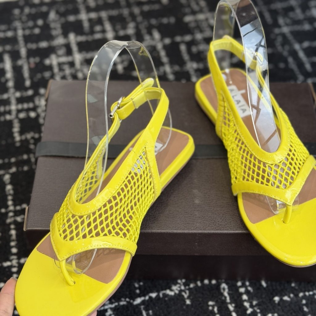 Alaia Ankle-Strap Flat Sandals in Genuine Lambskin with Calfskin Lining and Durable Rubber Sole