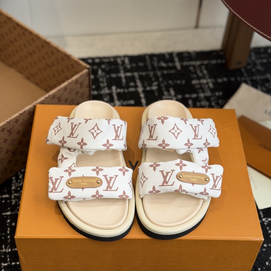 LOUIS VUITTON Flat Slide Sandals in Genuine Calfskin with Lambskin Lining and Italian Leather Sole