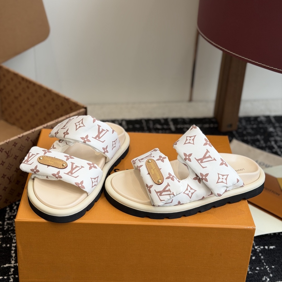 LOUIS VUITTON Flat Slide Sandals in Genuine Calfskin with Lambskin Lining and Italian Leather Sole