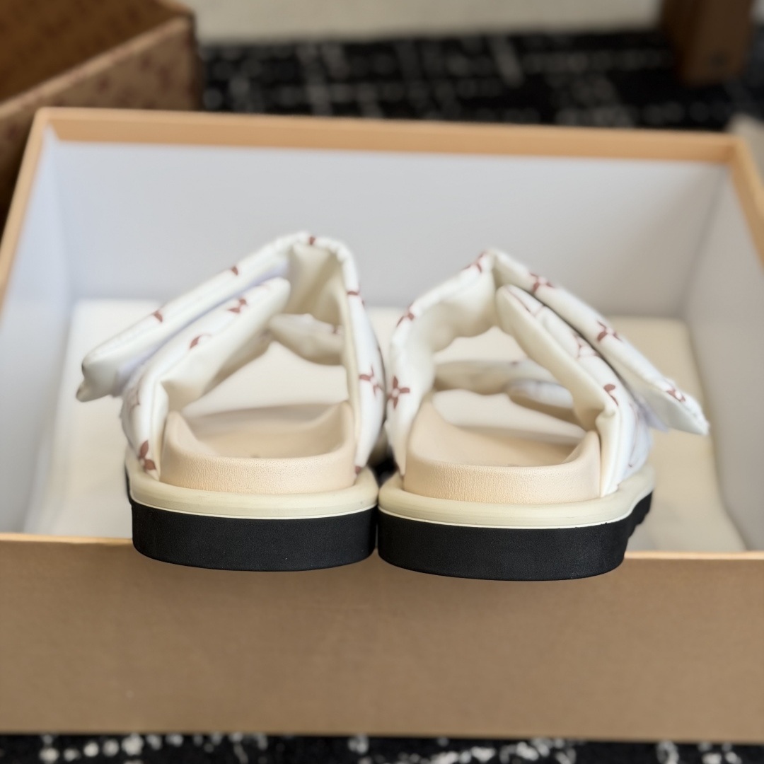 LOUIS VUITTON Flat Slide Sandals in Genuine Calfskin with Lambskin Lining and Italian Leather Sole