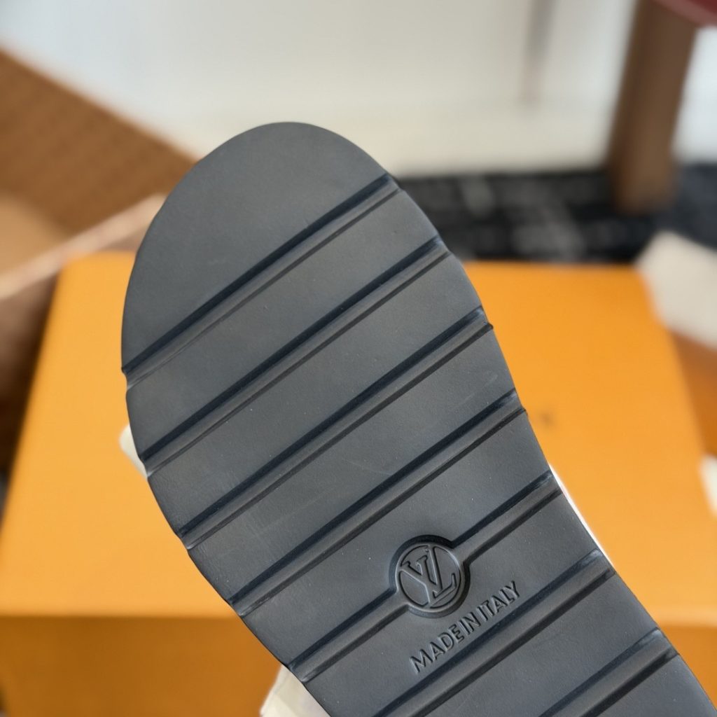 LOUIS VUITTON Flat Slide Sandals in Genuine Calfskin with Lambskin Lining and Italian Leather Sole