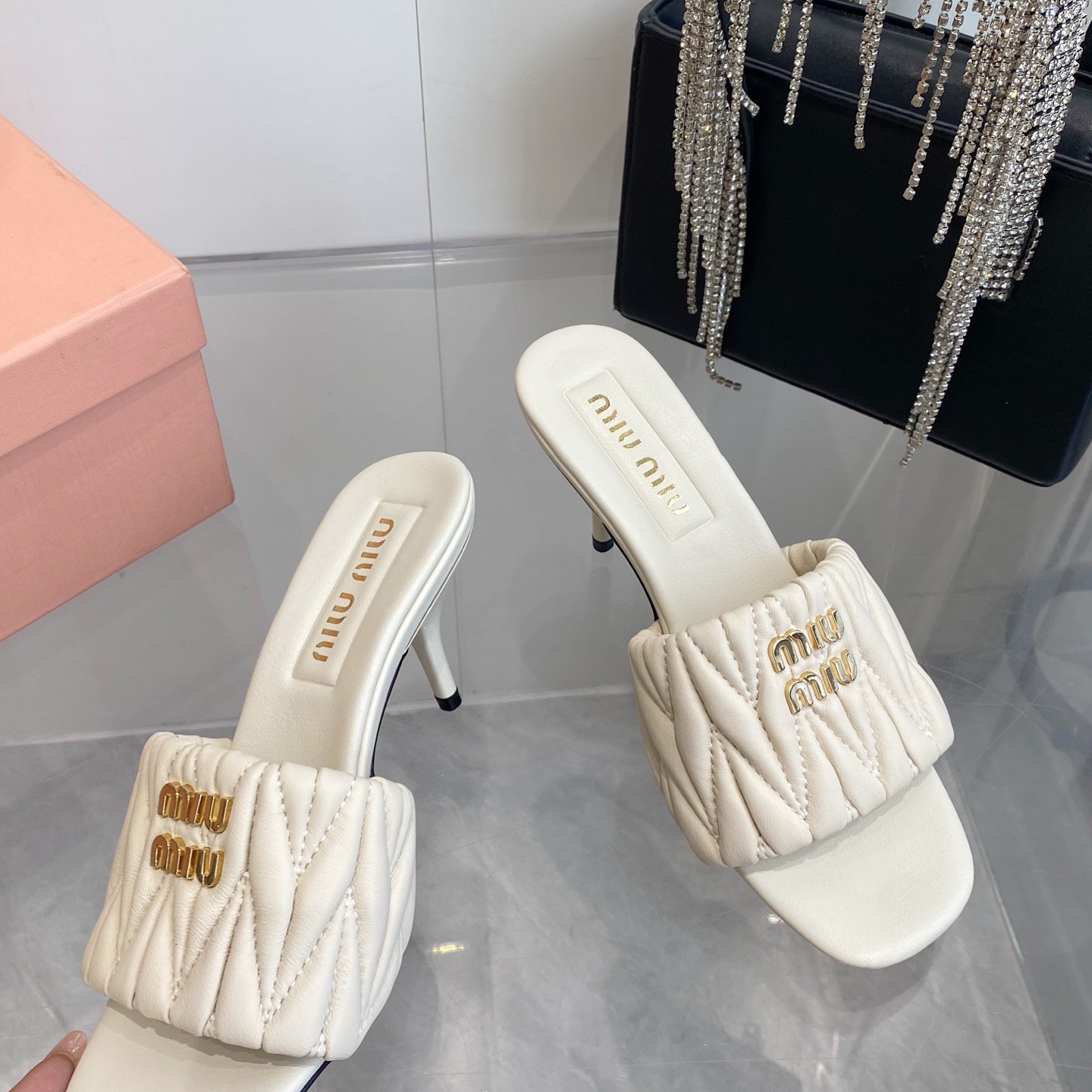 Miu Miu Quilted Flat Sandals in Genuine Lambskin with Metal Logo Calfskin Lining Italian Leather Sol