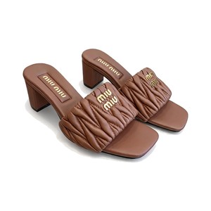Miu Miu Quilted Flat Slide Sandals in Genuine Lambskin with Metal Logo Calfskin Lining Italian Leath