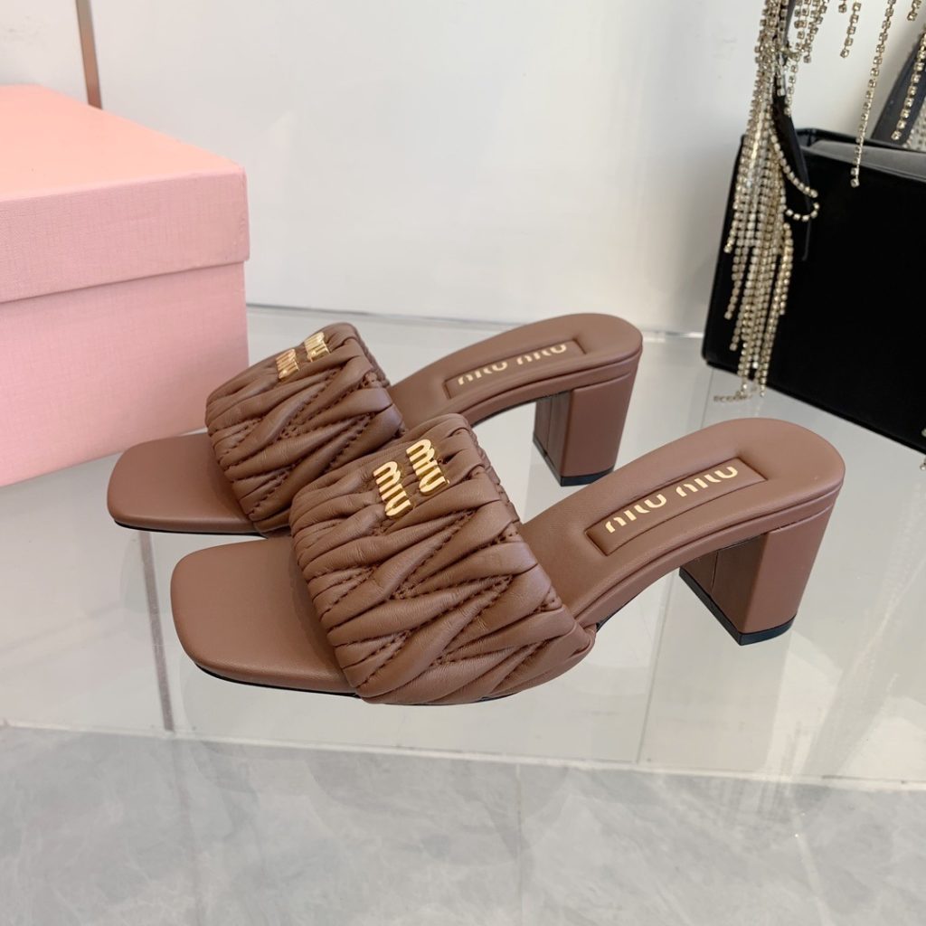 Miu Miu Quilted Flat Slide Sandals in Genuine Lambskin with Metal Logo Calfskin Lining Italian Leath