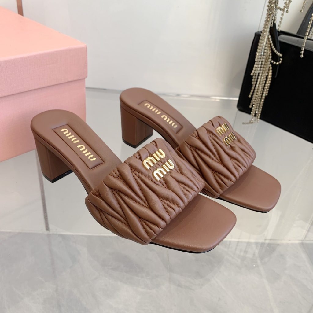 Miu Miu Quilted Flat Slide Sandals in Genuine Lambskin with Metal Logo Calfskin Lining Italian Leath