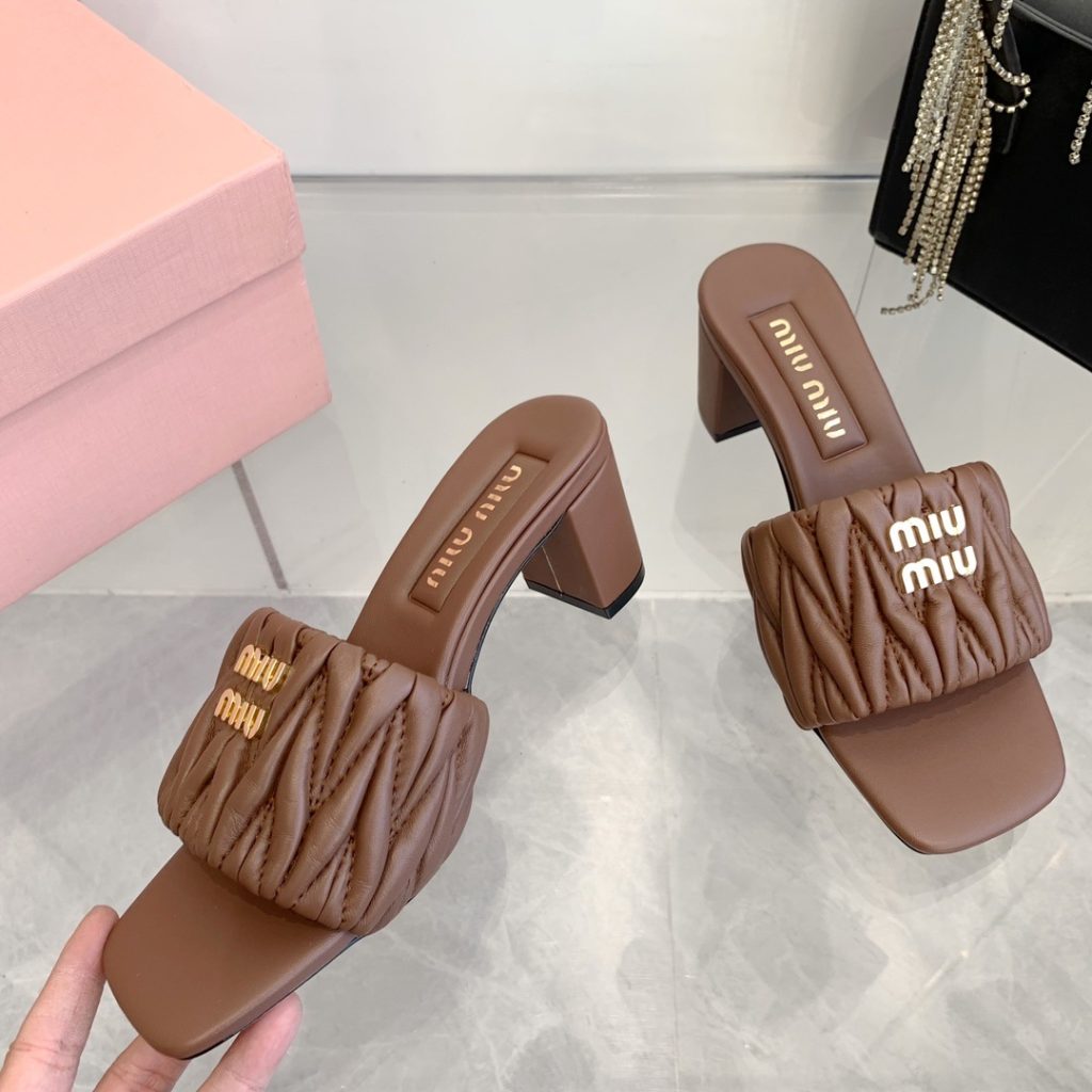 Miu Miu Quilted Flat Slide Sandals in Genuine Lambskin with Metal Logo Calfskin Lining Italian Leath