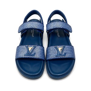 LOUIS VUITTON Flat Slide Sandals in Genuine Calfskin with Lambskin Lining and Italian Leather Sole