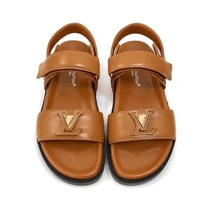 LOUIS VUITTON Flat Slide Sandals in Genuine Calfskin with Lambskin Lining and Italian Leather Sole