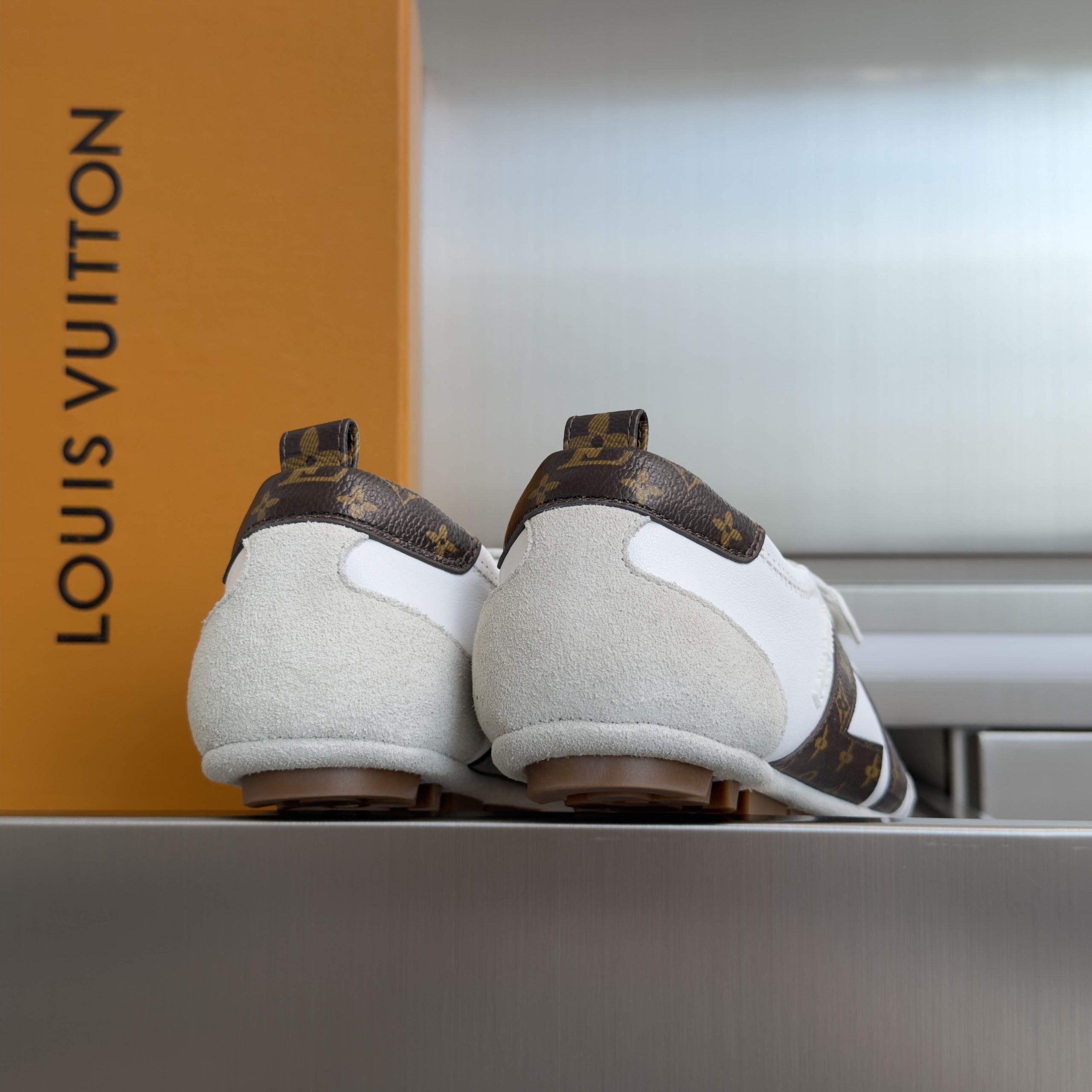 LOUIS VUITTON Casual Sneakers, Premium Leather with Round Toe Lace-Up and Molded Rubber Outsole