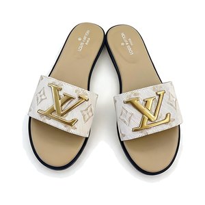 LOUIS VUITTON Flat Slide Sandals in Genuine Calfskin with Lambskin Lining and Italian Leather Sole