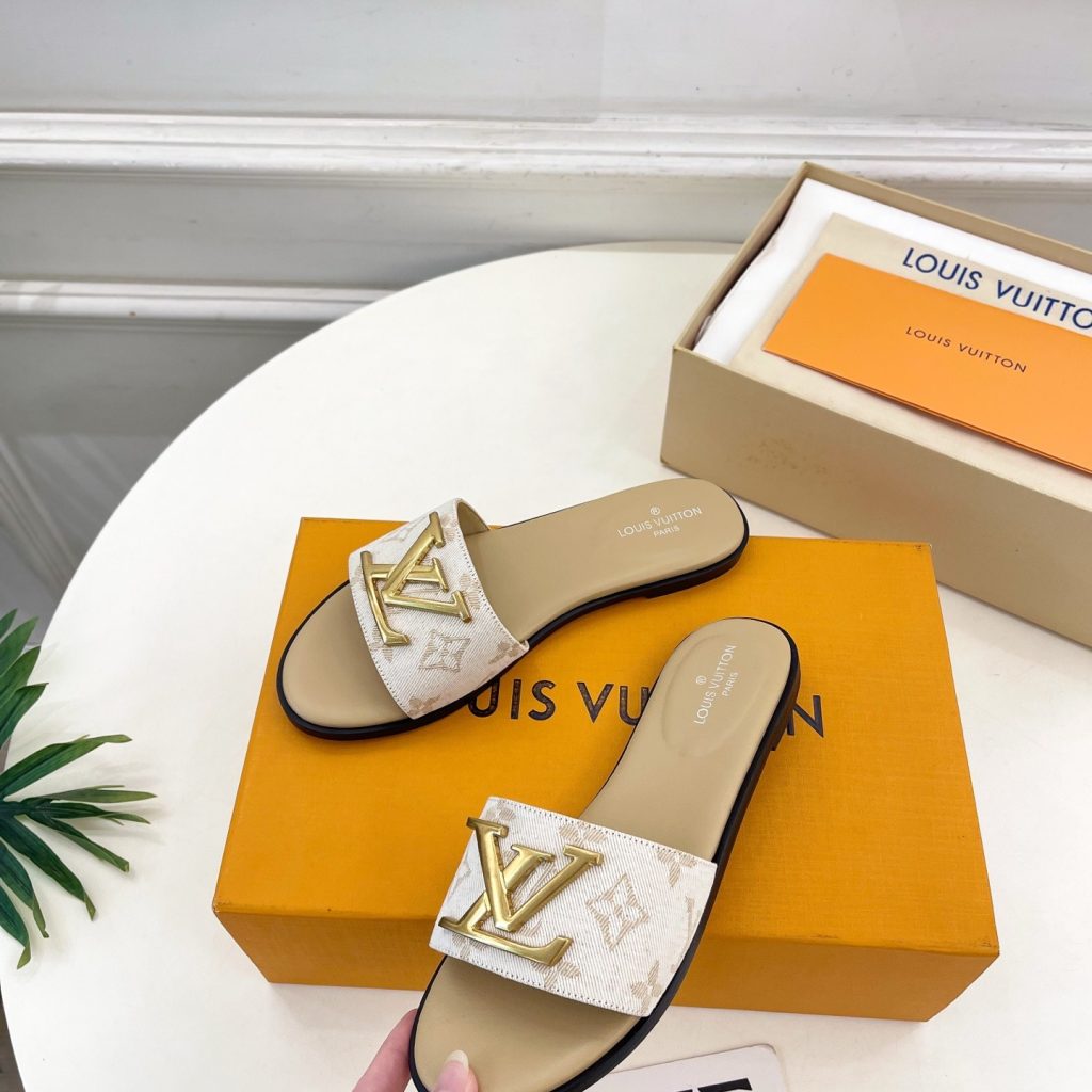 LOUIS VUITTON Flat Slide Sandals in Genuine Calfskin with Lambskin Lining and Italian Leather Sole