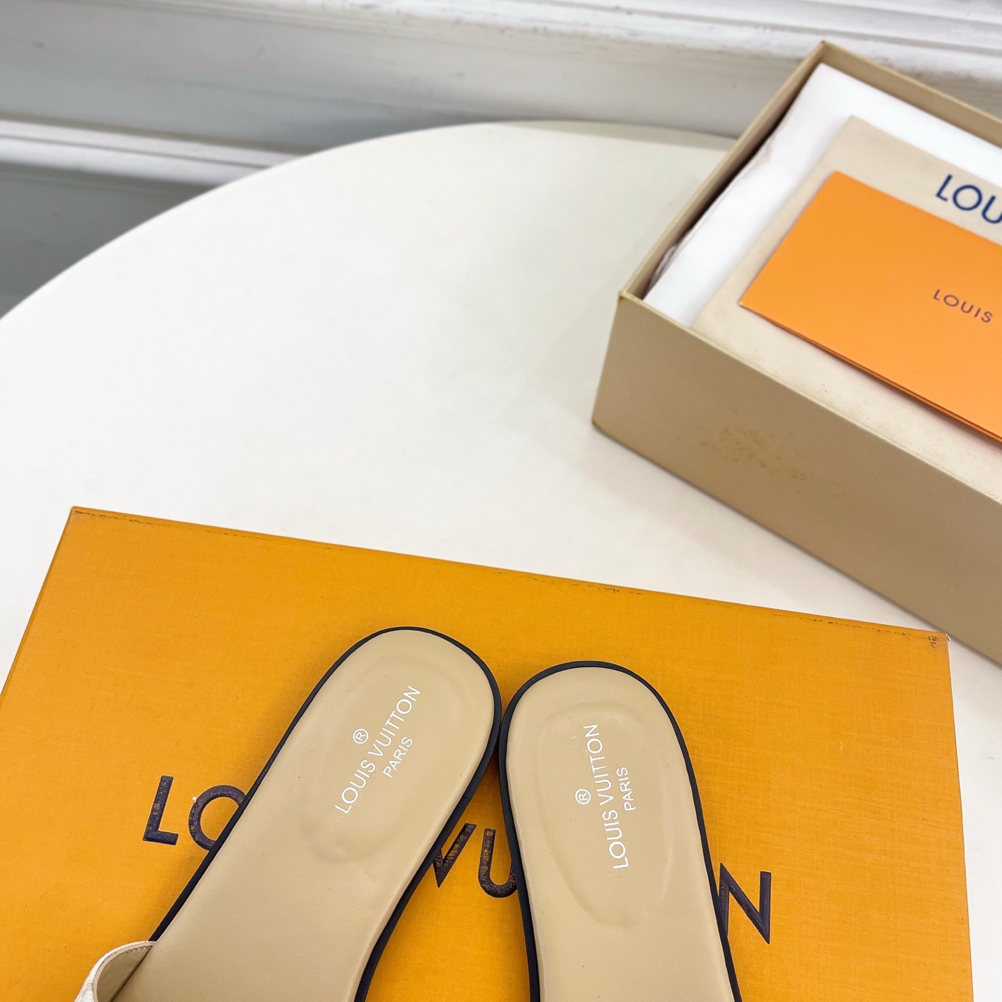 LOUIS VUITTON Flat Slide Sandals in Genuine Calfskin with Lambskin Lining and Italian Leather Sole