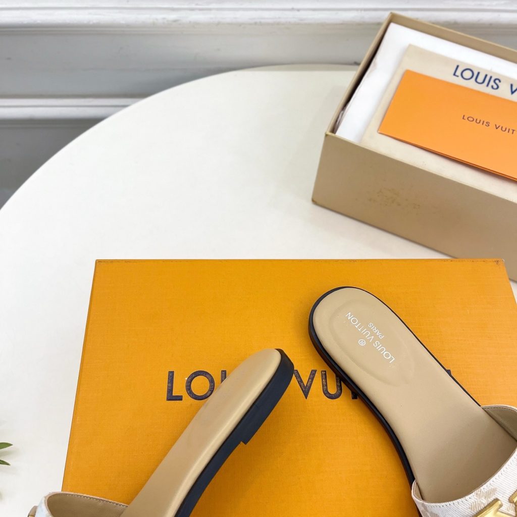 LOUIS VUITTON Flat Slide Sandals in Genuine Calfskin with Lambskin Lining and Italian Leather Sole