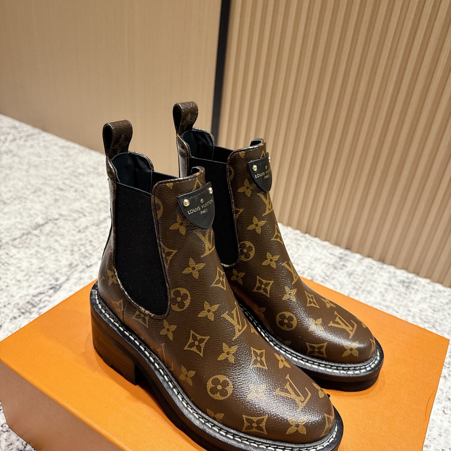 LOUIS VUITTON Classic Ankle Boots, Premium Leather Upper with Pull Tab and Molded Rubber Outsole
