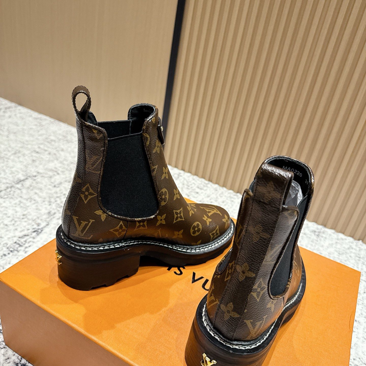 LOUIS VUITTON Classic Ankle Boots, Premium Leather Upper with Pull Tab and Molded Rubber Outsole
