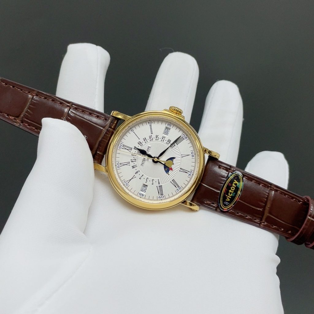 Patek Philippe Automatic Watch, Silver Dial Roman Numeral Date Yellow Gold Case Leather Strap 30m
