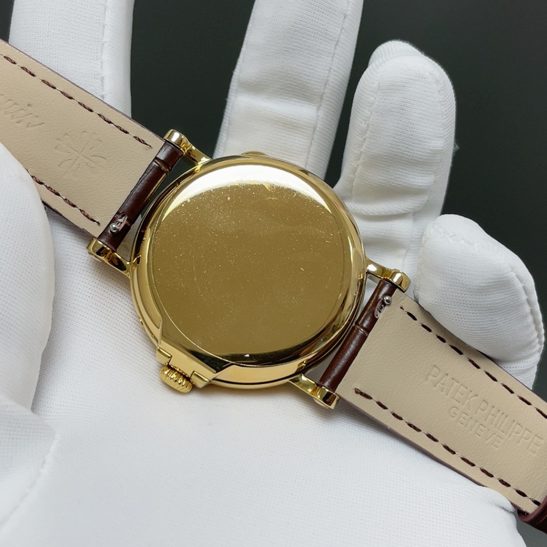 Patek Philippe Automatic Watch, Silver Dial Roman Numeral Date Yellow Gold Case Leather Strap 30m