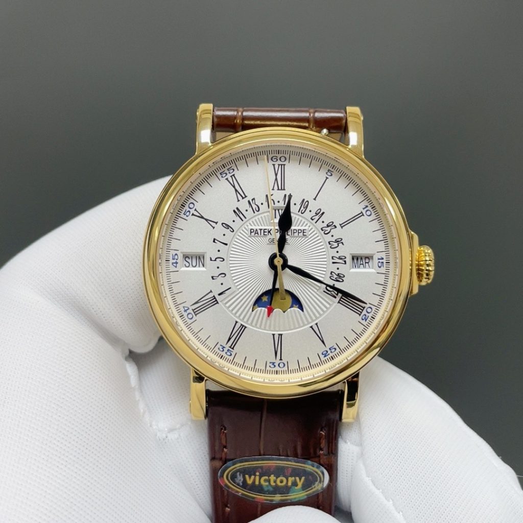 Patek Philippe Automatic Watch, Silver Dial Roman Numeral Date Yellow Gold Case Leather Strap 30m